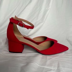 Bright red pointed toe, chunky heels with ankle strap